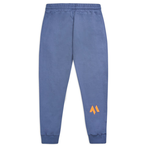 This is a rear product view of the new standard joggers in blue steel showing off the orange emblem on the right calf