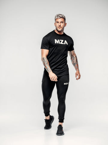This is Shane mid step wearing the new standard long line t-shirt in black paired with the new standard joggers in black.