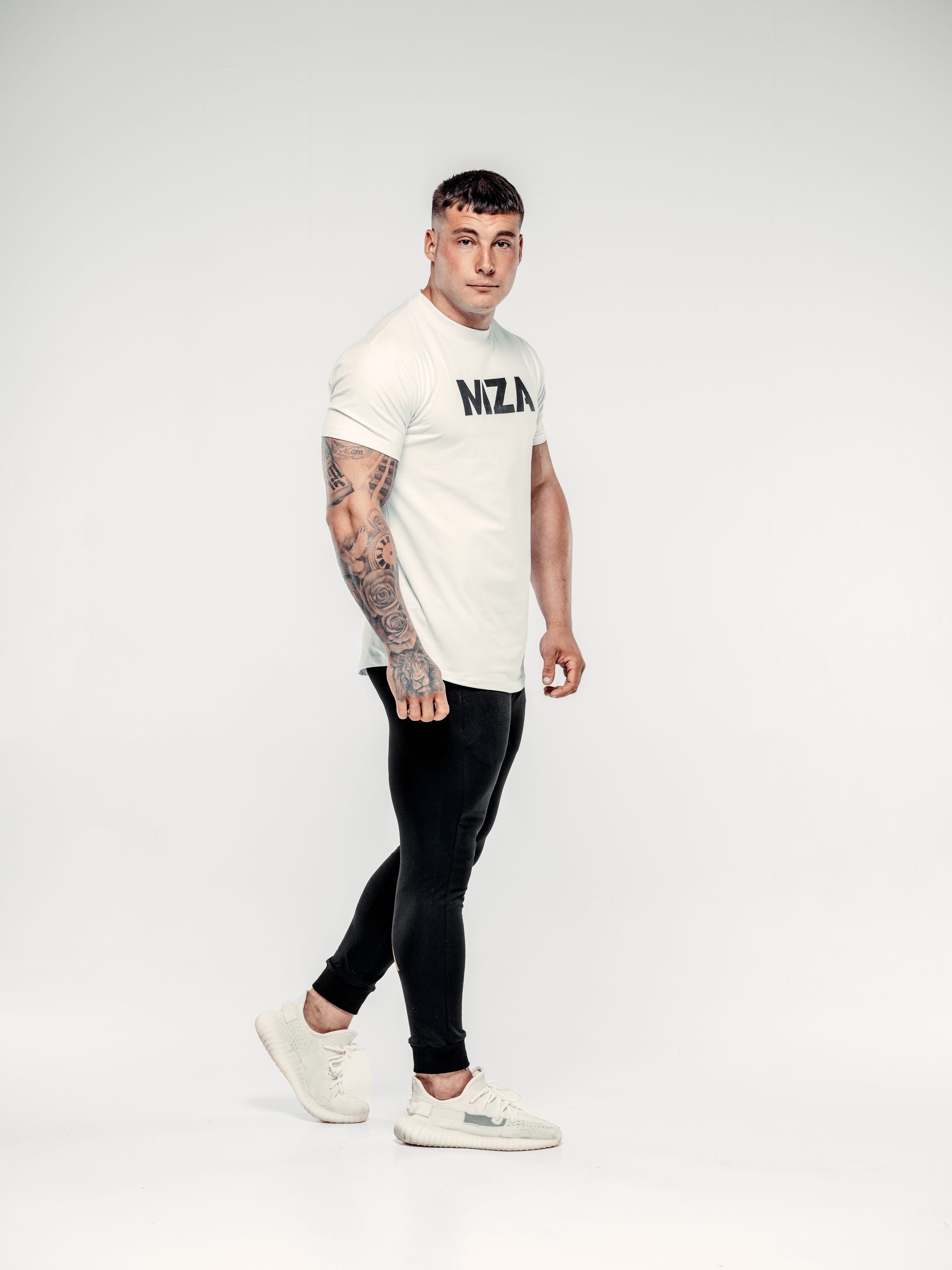 This is Lewis mid step wearing the new standard long line t-shirt in white and the new standard joggers in black