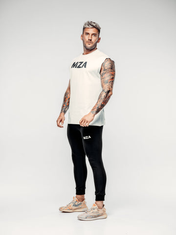 This is a full body shot of Shane wearing the new standard vest in white