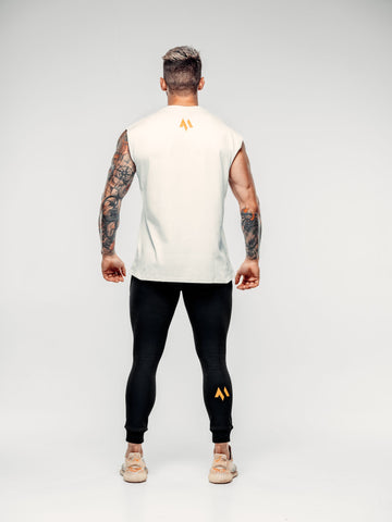 This is a rear full body shot of Shane wearing the new standard vest in white.  It shows off the M emblem in signature orange below the neck and on the right calf