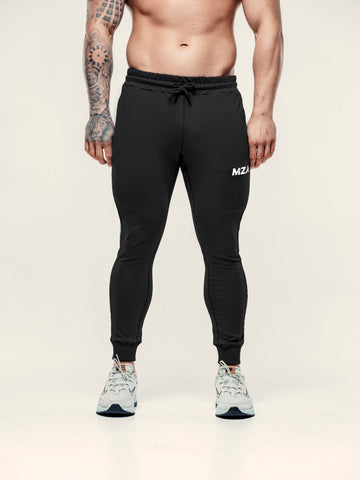 This is a bottom half shot of Lewis wearing the new standard joggers in black